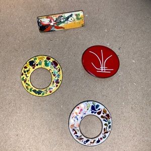 Four vintage copper painted enamel brooches